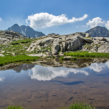 Yalovarnika peak and Zabat (The Tooth) Peak and their reflection in mountain lake